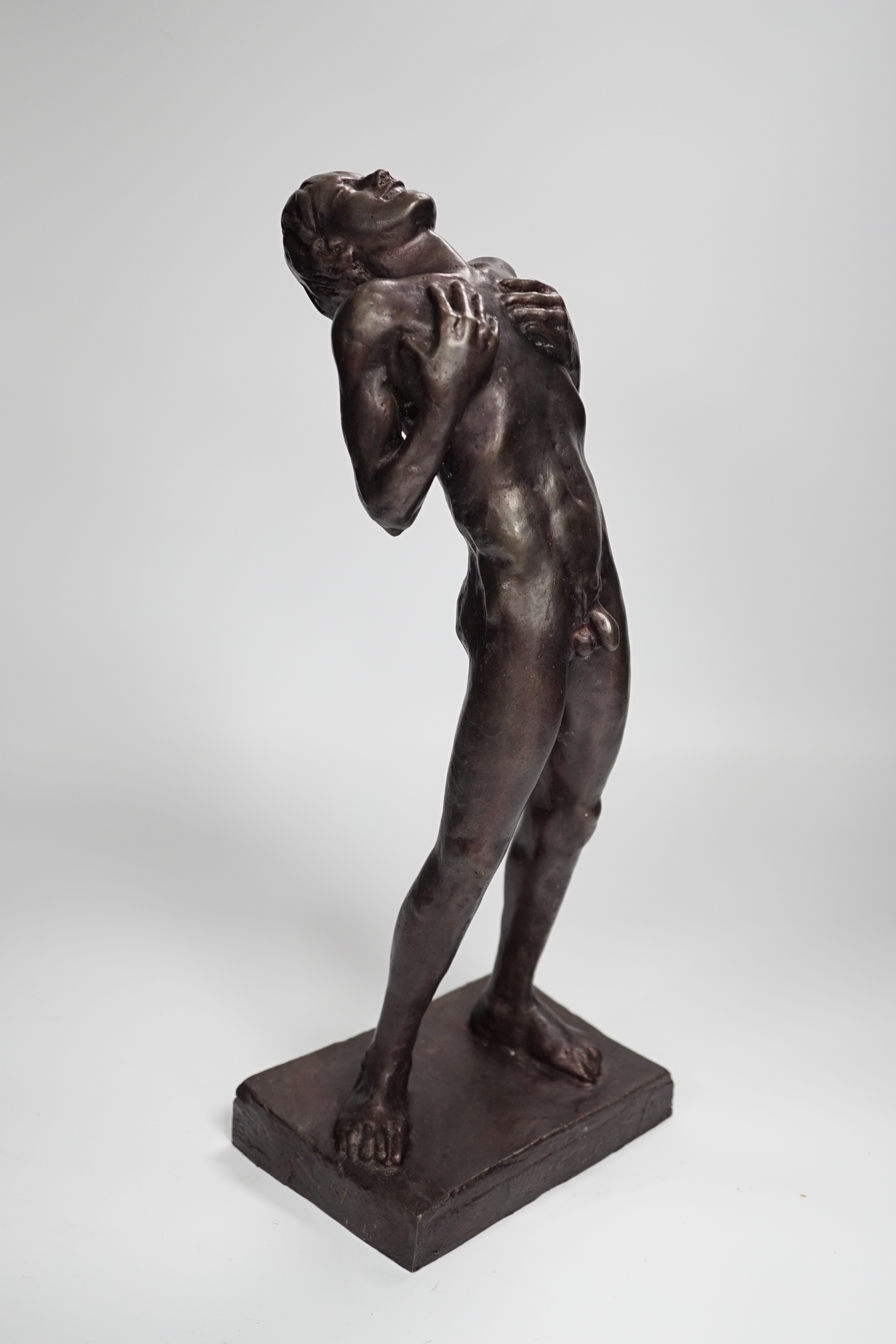 A bronze of a standing male nude, 36cm high